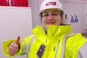 Torie in high vis giving a thumbs up